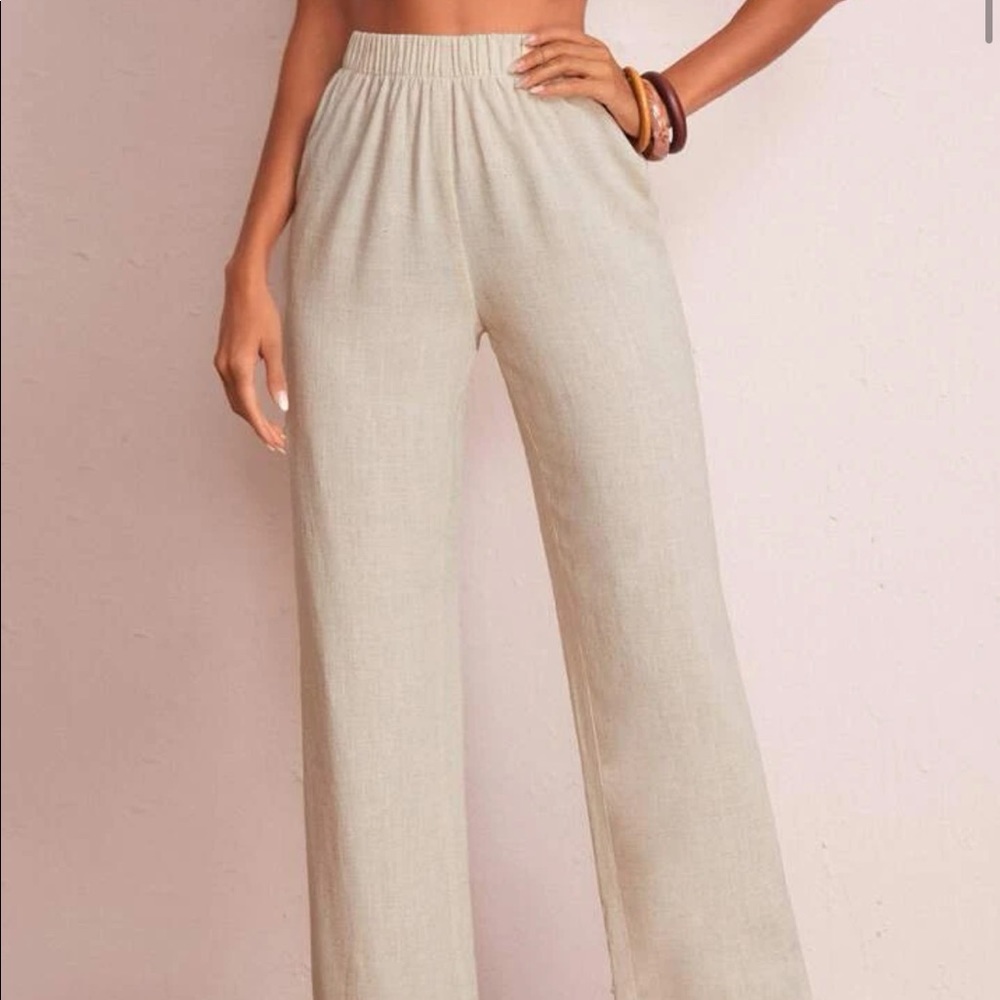 Beige wide leg elastic pants. Perfect for the beach or could dress up for work.